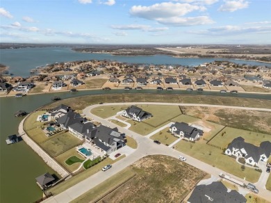 Experience true luxury in this breathtaking executive estate on The Golf Club at Resort Eagle Mountain Lake in Texas - for sale on GolfHomes.com, golf home, golf lot