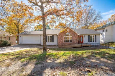 Comfortable handicap accessible home with large deck overlooking on Diamondhead Golf and Country Club in Arkansas - for sale on GolfHomes.com, golf home, golf lot