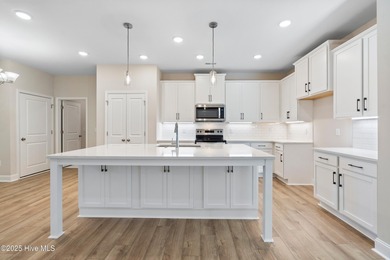 Experience the ease of single-level living in the Somerset III on Green Hills Golf Course in North Carolina - for sale on GolfHomes.com, golf home, golf lot