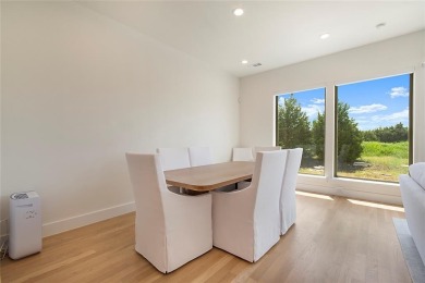 Step inside this stunning two bedroom townhome in Heath Golf and on Heath Golf and Yacht Club in Texas - for sale on GolfHomes.com, golf home, golf lot