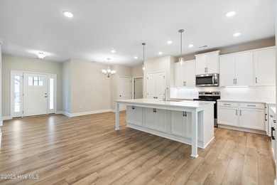 Experience the ease of single-level living in the Somerset III on Green Hills Golf Course in North Carolina - for sale on GolfHomes.com, golf home, golf lot