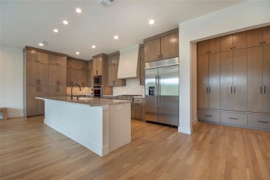 Step inside this stunning two bedroom townhome in Heath Golf and on Heath Golf and Yacht Club in Texas - for sale on GolfHomes.com, golf home, golf lot