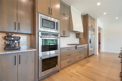 Step inside this stunning two bedroom townhome in Heath Golf and on Heath Golf and Yacht Club in Texas - for sale on GolfHomes.com, golf home, golf lot