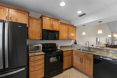 Stunning 2-bedroom, 2-bath condo with beautiful golf course on Plantation Golf and Country Club in Florida - for sale on GolfHomes.com, golf home, golf lot