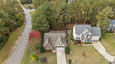 The best of both worlds! Family time downstairs & a bonus room on Anderson Creek Golf Club in North Carolina - for sale on GolfHomes.com, golf home, golf lot