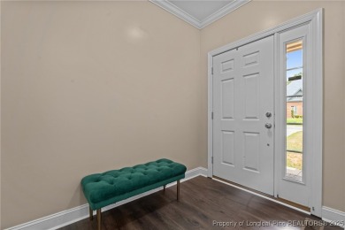 The best of both worlds! Family time downstairs & a bonus room on Anderson Creek Golf Club in North Carolina - for sale on GolfHomes.com, golf home, golf lot