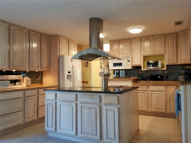 PRICE REDUCTION!  Stunning Wild Oak Bay Villa with Exceptional on IMG Academies Golf and Country Club in Florida - for sale on GolfHomes.com, golf home, golf lot
