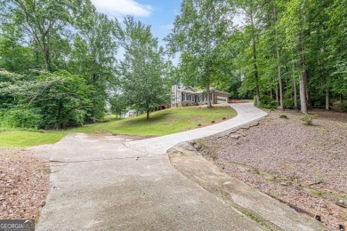 Freshly Renovated 3 Bedroom/2 Bathroom Home perched up high on 2 on Lake Spivey Golf Club in Georgia - for sale on GolfHomes.com, golf home, golf lot