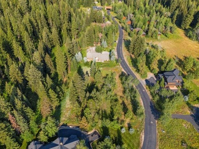 Nestled among majestic towering pines, this exceptional .78-acre on Osprey Meadows at Tamarack Resort in Idaho - for sale on GolfHomes.com, golf home, golf lot