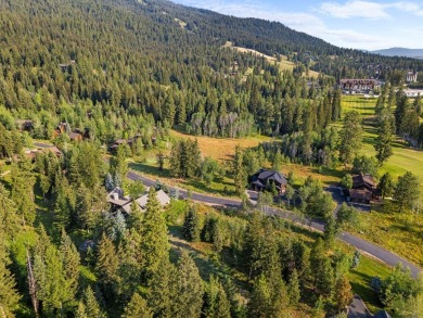 Nestled among majestic towering pines, this exceptional .78-acre on Osprey Meadows at Tamarack Resort in Idaho - for sale on GolfHomes.com, golf home, golf lot