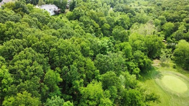 Stunning 3+ wooded acres over looking the fairway of the on Paradise Valley Country Club in Missouri - for sale on GolfHomes.com, golf home, golf lot