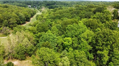 Stunning 3+ wooded acres over looking the fairway of the on Paradise Valley Country Club in Missouri - for sale on GolfHomes.com, golf home, golf lot