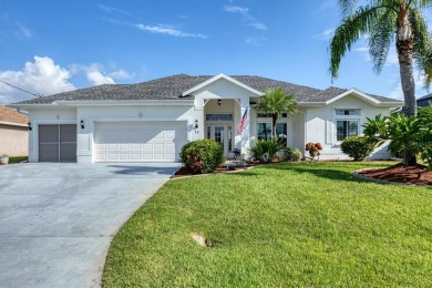 *** PRICE IMPROVEMENT***EXPANSIVE Water and Golf views set this on Rotonda Golf and Country Club - Long Marsh  in Florida - for sale on GolfHomes.com, golf home, golf lot