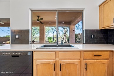 Step into this beautifully updated residence located in the on Tatum Ranch Golf Course in Arizona - for sale on GolfHomes.com, golf home, golf lot