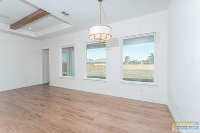 Discover luxury living with this stunning 3 bedroom, 2.5 bath, 1 on South Padre Island Golf Club in Texas - for sale on GolfHomes.com, golf home, golf lot