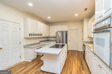 Step into your future in the beautiful Tamerlane neighborhood on Braelinn Golf Club in Georgia - for sale on GolfHomes.com, golf home, golf lot