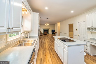 Step into your future in the beautiful Tamerlane neighborhood on Braelinn Golf Club in Georgia - for sale on GolfHomes.com, golf home, golf lot