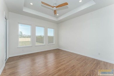 Discover luxury living with this stunning 3 bedroom, 2.5 bath, 1 on South Padre Island Golf Club in Texas - for sale on GolfHomes.com, golf home, golf lot