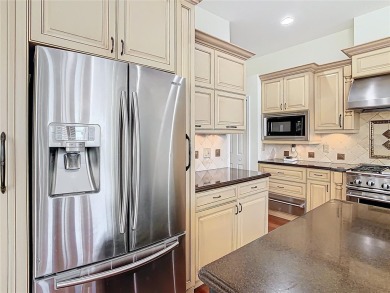 Golf course view home in Heritage Isle Community!!!  4 Bedroom on Heritage Isles Golf and Country Club in Florida - for sale on GolfHomes.com, golf home, golf lot
