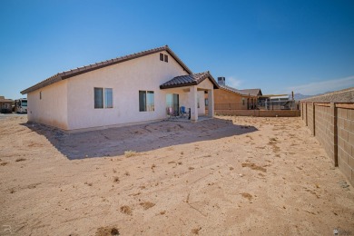 Step into modern luxury at 28412 Canal Avenue, Wellton, AZ. This on The Links At Coyote Wash in Arizona - for sale on GolfHomes.com, golf home, golf lot