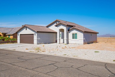 Step into modern luxury at 28412 Canal Avenue, Wellton, AZ. This on The Links At Coyote Wash in Arizona - for sale on GolfHomes.com, golf home, golf lot