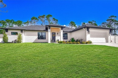 Welcome to your Florida dream home, beautifully positioned on a on Sabal Trace Golf and Country Club in Florida - for sale on GolfHomes.com, golf home, golf lot