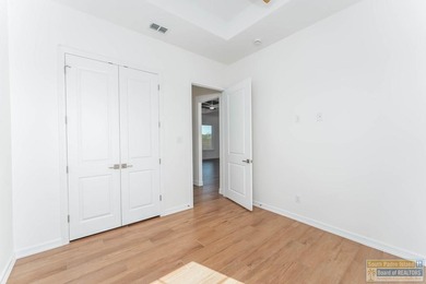 Discover luxury living with this stunning 3 bedroom, 2.5 bath, 1 on South Padre Island Golf Club in Texas - for sale on GolfHomes.com, golf home, golf lot