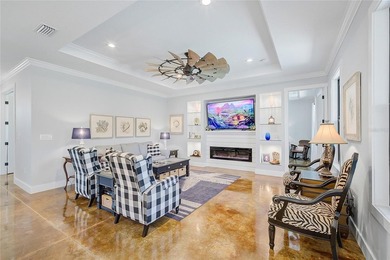 Welcome to your Florida dream home, beautifully positioned on a on Sabal Trace Golf and Country Club in Florida - for sale on GolfHomes.com, golf home, golf lot