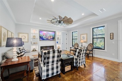 Welcome to your Florida dream home, beautifully positioned on a on Sabal Trace Golf and Country Club in Florida - for sale on GolfHomes.com, golf home, golf lot