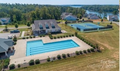 Start the summer off right in this relaxing and fun lake and on Edgewater Golf Club in South Carolina - for sale on GolfHomes.com, golf home, golf lot