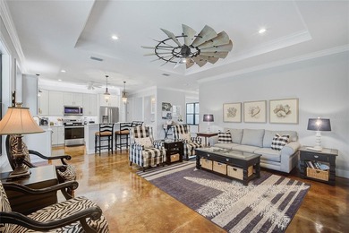 Welcome to your Florida dream home, beautifully positioned on a on Sabal Trace Golf and Country Club in Florida - for sale on GolfHomes.com, golf home, golf lot