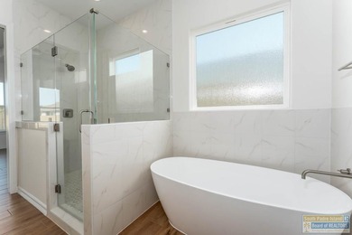 Discover luxury living with this stunning 3 bedroom, 2.5 bath, 1 on South Padre Island Golf Club in Texas - for sale on GolfHomes.com, golf home, golf lot