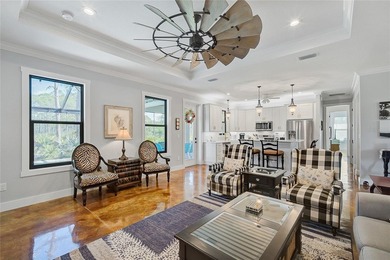 Welcome to your Florida dream home, beautifully positioned on a on Sabal Trace Golf and Country Club in Florida - for sale on GolfHomes.com, golf home, golf lot