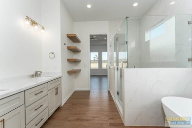 Discover luxury living with this stunning 3 bedroom, 2.5 bath, 1 on South Padre Island Golf Club in Texas - for sale on GolfHomes.com, golf home, golf lot