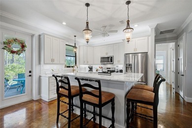 Welcome to your Florida dream home, beautifully positioned on a on Sabal Trace Golf and Country Club in Florida - for sale on GolfHomes.com, golf home, golf lot