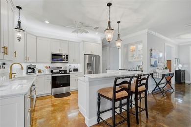 Welcome to your Florida dream home, beautifully positioned on a on Sabal Trace Golf and Country Club in Florida - for sale on GolfHomes.com, golf home, golf lot