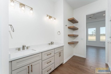 Discover luxury living with this stunning 3 bedroom, 2.5 bath, 1 on South Padre Island Golf Club in Texas - for sale on GolfHomes.com, golf home, golf lot