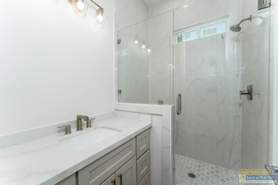 Discover luxury living with this stunning 3 bedroom, 2.5 bath, 1 on South Padre Island Golf Club in Texas - for sale on GolfHomes.com, golf home, golf lot