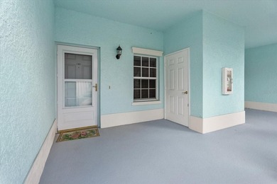 If you want relaxing, tranquil water views and beautiful sunsets on Sabal Trace Golf and Country Club in Florida - for sale on GolfHomes.com, golf home, golf lot