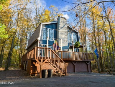 CONTEMPORARY LOG-SIDED CHALET, JUST A MINUTE OR TWO WALK TO THE on The Hideout Golf in Pennsylvania - for sale on GolfHomes.com, golf home, golf lot
