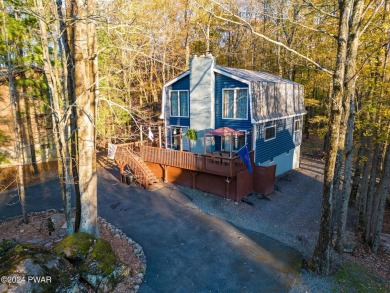 CONTEMPORARY LOG-SIDED CHALET, JUST A MINUTE OR TWO WALK TO THE on The Hideout Golf in Pennsylvania - for sale on GolfHomes.com, golf home, golf lot
