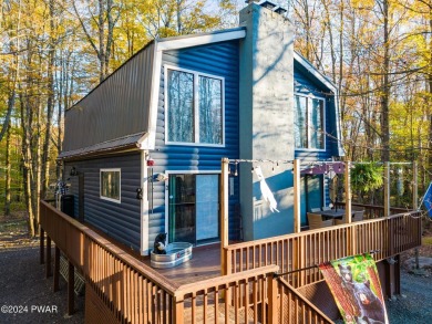 CONTEMPORARY LOG-SIDED CHALET, JUST A MINUTE OR TWO WALK TO THE on The Hideout Golf in Pennsylvania - for sale on GolfHomes.com, golf home, golf lot