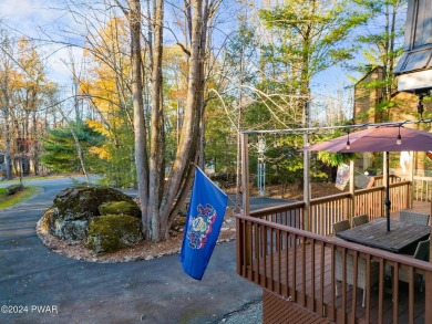 CONTEMPORARY LOG-SIDED CHALET, JUST A MINUTE OR TWO WALK TO THE on The Hideout Golf in Pennsylvania - for sale on GolfHomes.com, golf home, golf lot