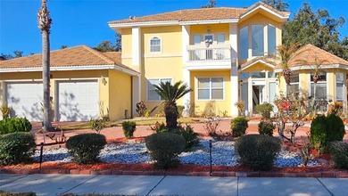 Come see this exceptionally well-designed two-story home in the on Kissimmee Bay Country Club in Florida - for sale on GolfHomes.com, golf home, golf lot