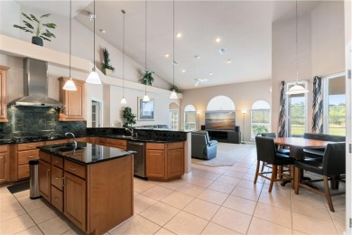 Your dream oasis awaits in this 5BR/3.5BA custom home with on Wedgefield Golf Club in Florida - for sale on GolfHomes.com, golf home, golf lot