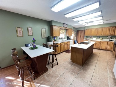 Prime Golf Course Living in Diamondhead | Wake up to sweeping on Diamondhead Country Club in Mississippi - for sale on GolfHomes.com, golf home, golf lot