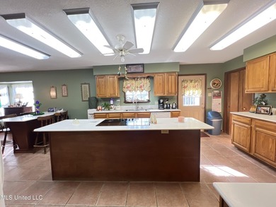 Prime Golf Course Living in Diamondhead | Wake up to sweeping on Diamondhead Country Club in Mississippi - for sale on GolfHomes.com, golf home, golf lot