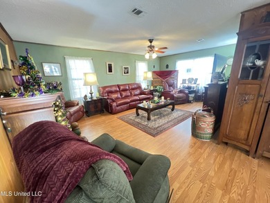 Prime Golf Course Living in Diamondhead | Wake up to sweeping on Diamondhead Country Club in Mississippi - for sale on GolfHomes.com, golf home, golf lot