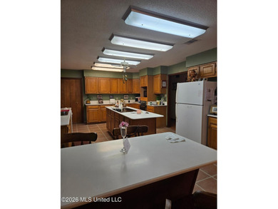 Prime Golf Course Living in Diamondhead | Wake up to sweeping on Diamondhead Country Club in Mississippi - for sale on GolfHomes.com, golf home, golf lot