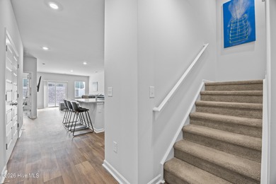 Elegantly appointed resale townhome located in The Hamptons at on Brunswick Plantation and Golf Resorts in North Carolina - for sale on GolfHomes.com, golf home, golf lot